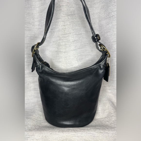 Coach Handbags - Coach Y2K Black Leather Bleecker Duffle w/ Tattersall Lining - Aprox 12” x 10”